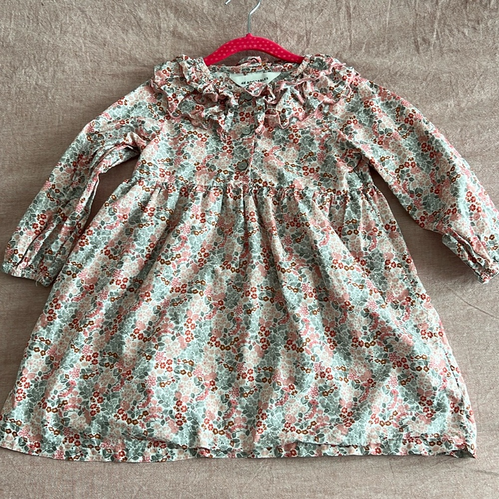 Excellent condition. Worn once for photos